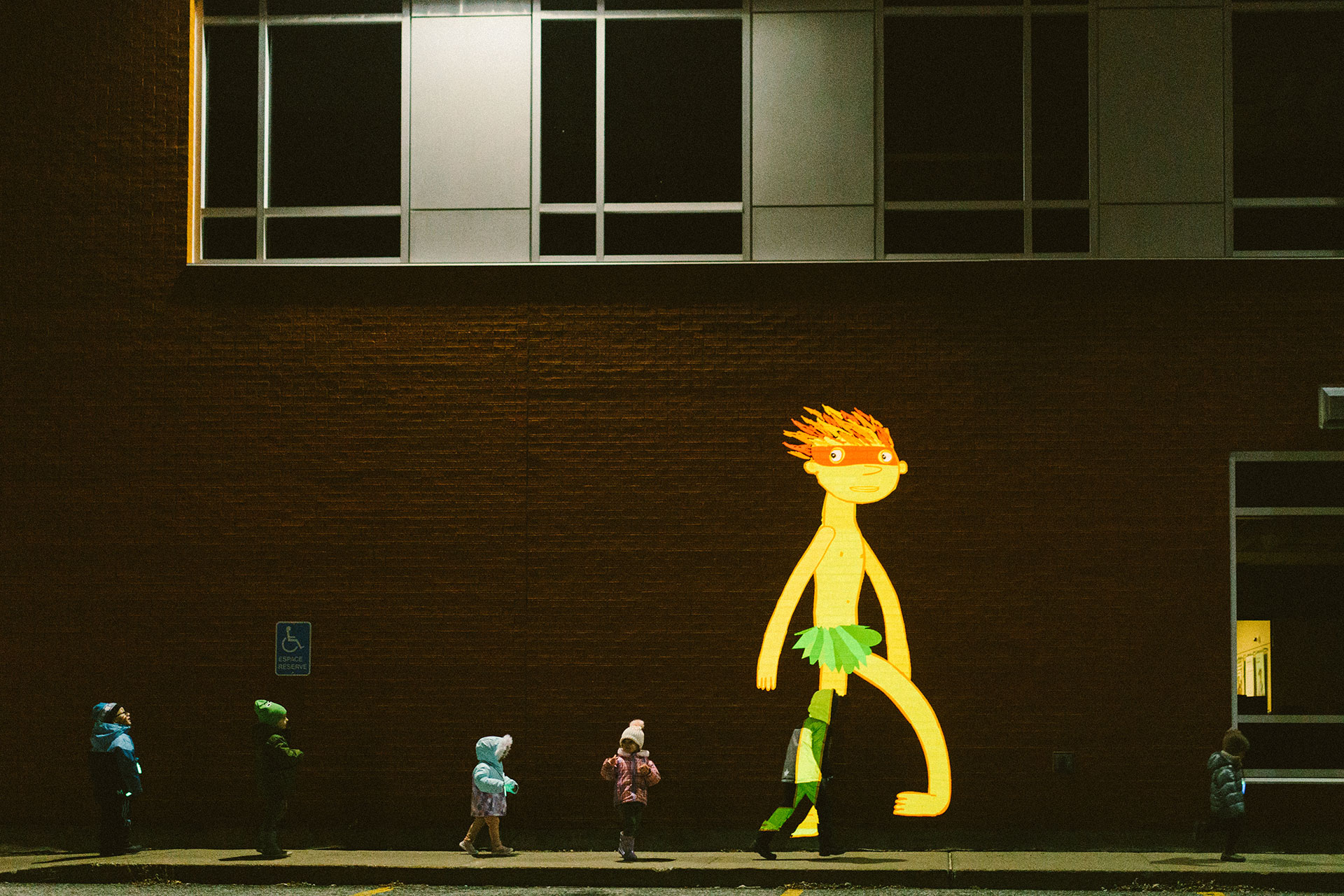 VJ Suave Suaveciclo conducting mobile projection mapping of folklore creatures