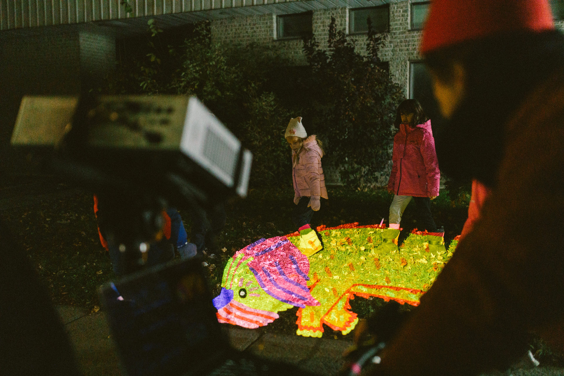 VJ Suave mapping projections of an animated dog on a city street